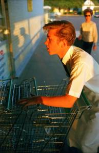 William Eggleston, Untitled Supermarket boy with carts  Memphis, 1965